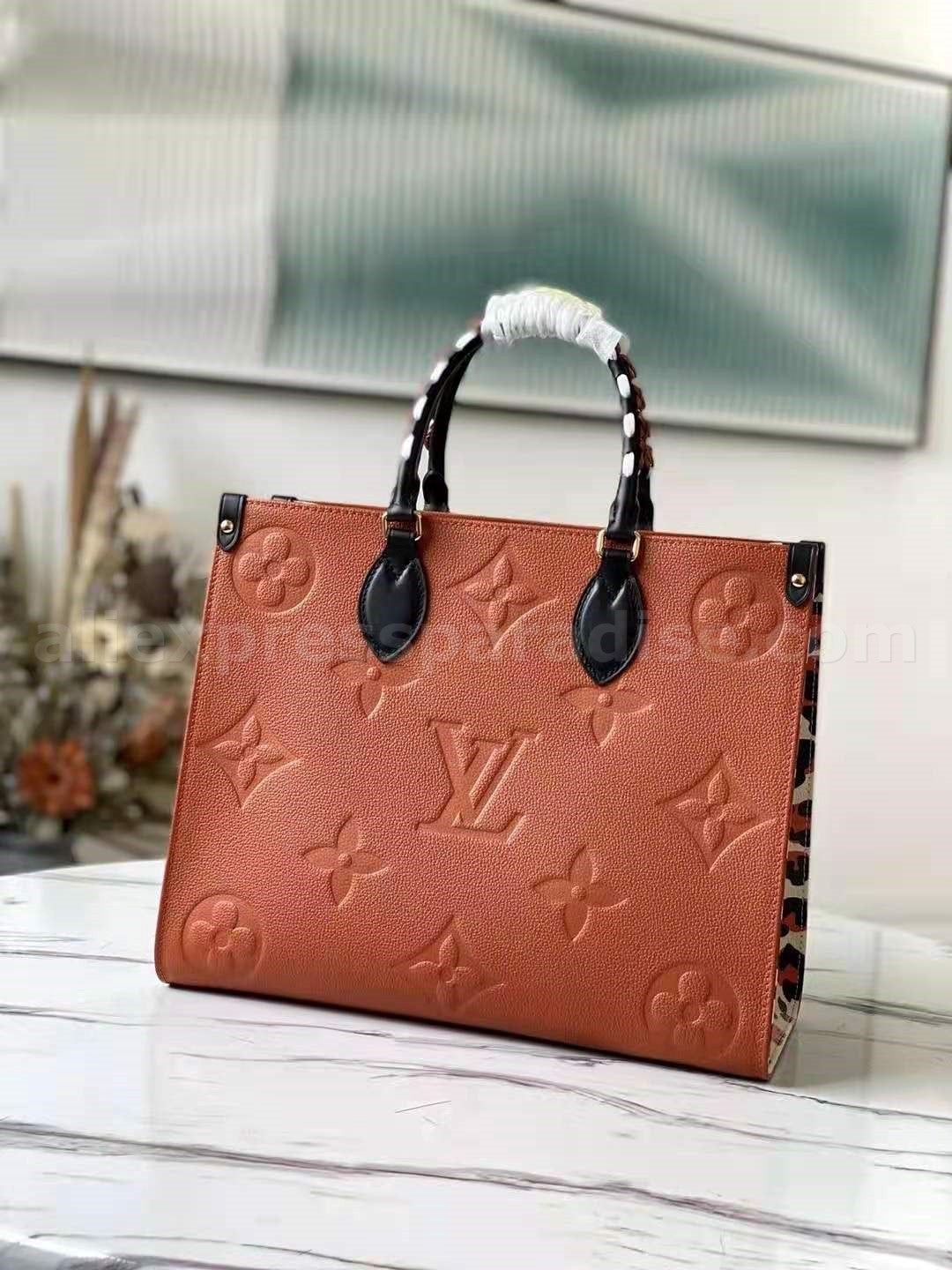 lv wild at heart tote