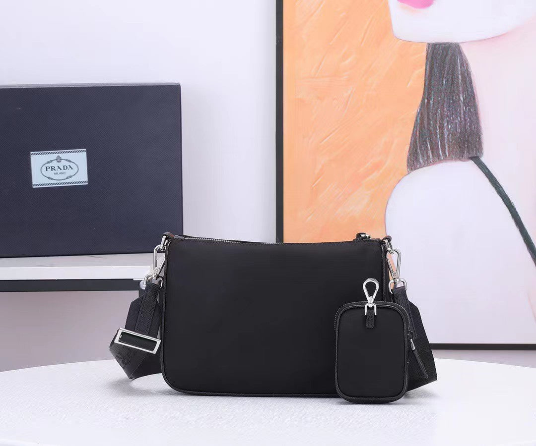 Prada RE-Nylon and Leather Shoulder Bag - Pervinca color